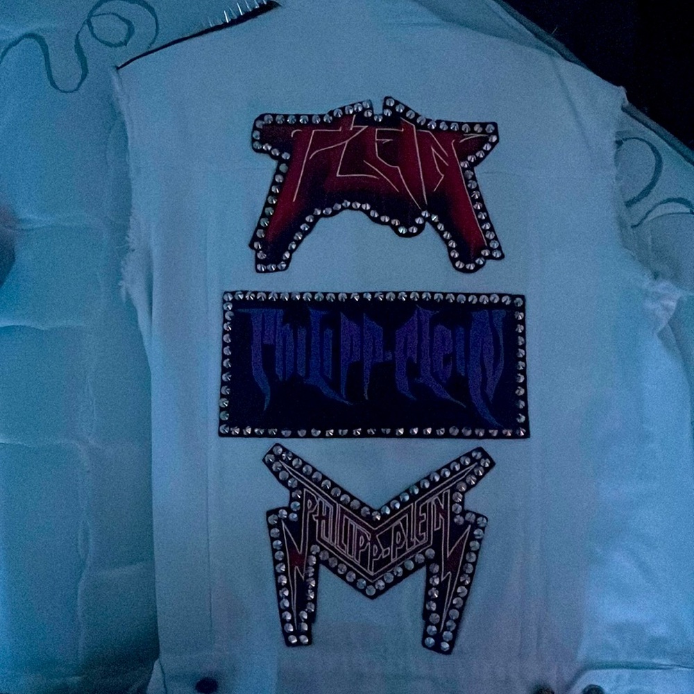 Im selling this sleeveless jean jacket from Phillip Plein